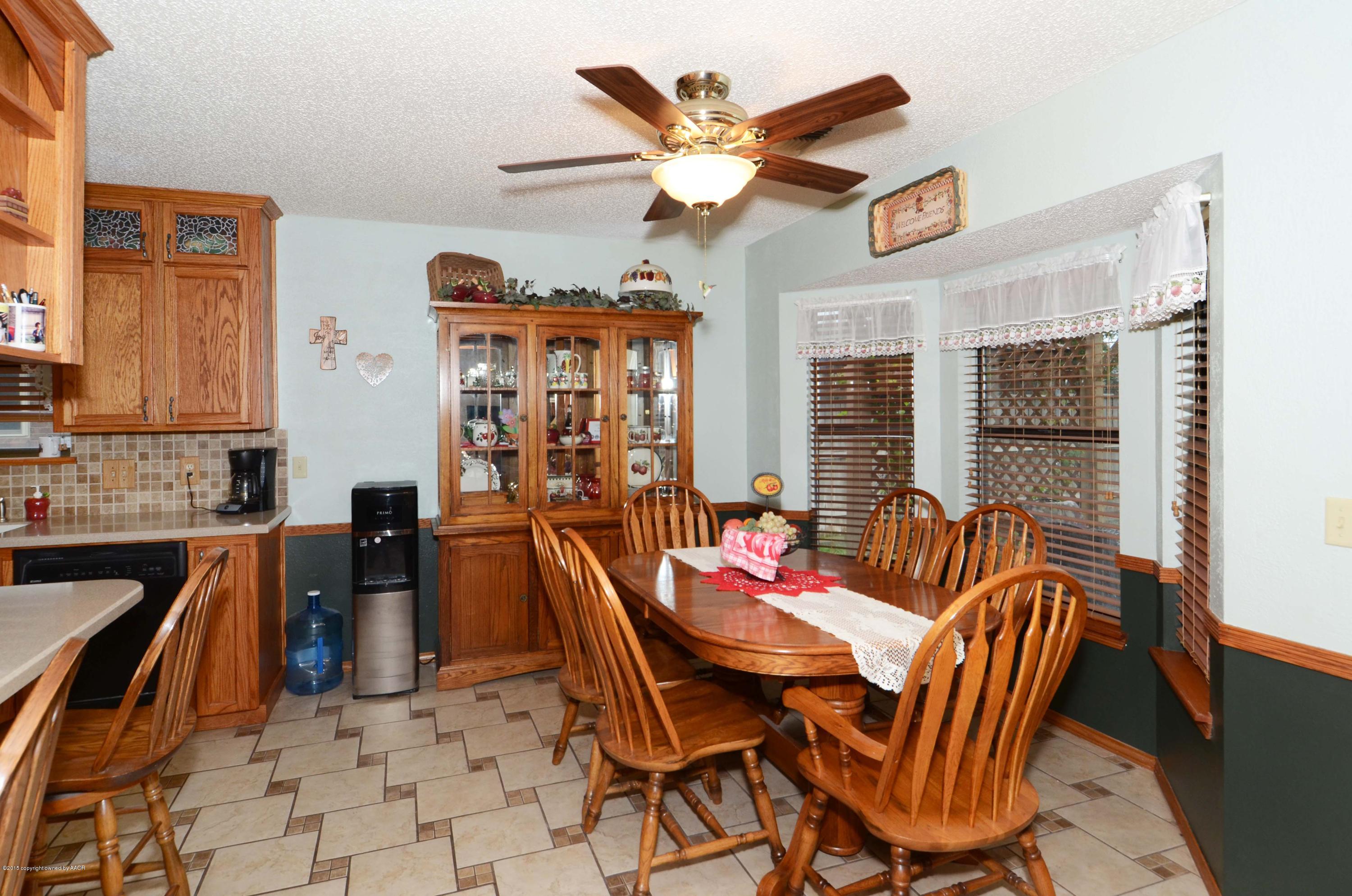 8104 Leah Trail Amarillo, TX 79110 - Photo 7 of 22 a dining room with furniture and window