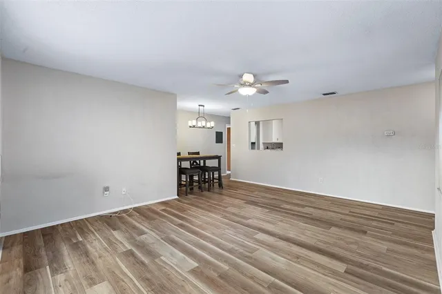 a view of an empty room with a window