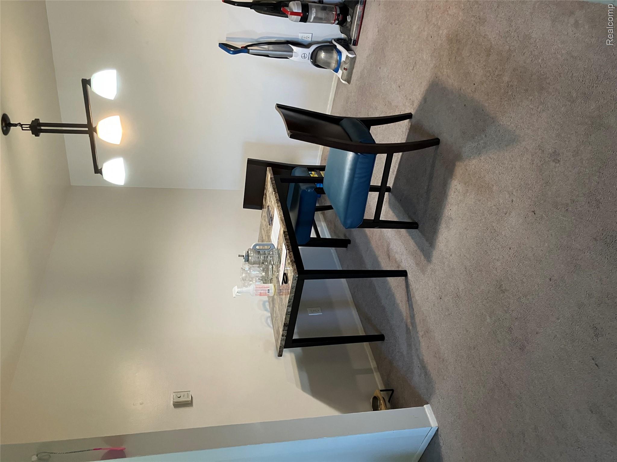 26790 Joy Road, Unit 7 Redford, MI 48239 - Photo 7 of 8 Dining room with light carpet