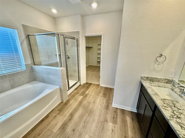 a bathroom with a sink and a bathtub