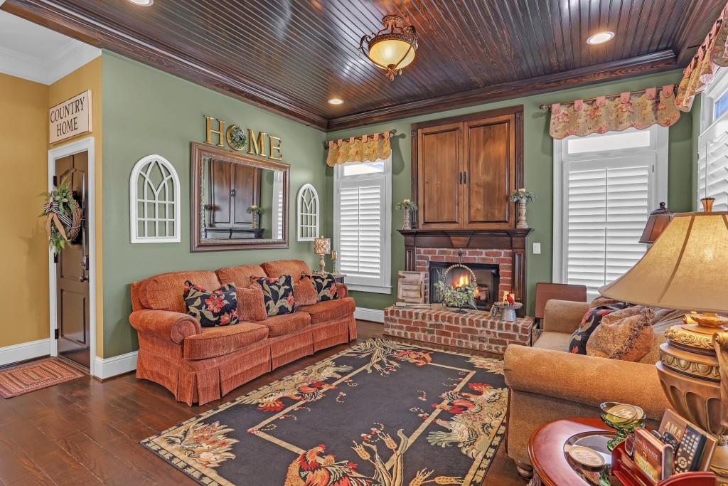 3386 Chandler Road Good Hope, GA 30641 - Photo 25 of 96 a living room with furniture fireplace and a large window