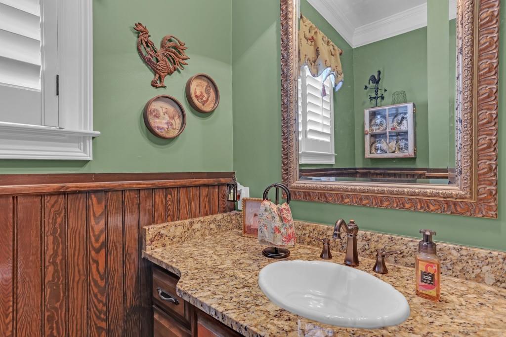 3386 Chandler Road Good Hope, GA 30641 - Photo 27 of 96 a bathroom with a granite countertop sink and a mirror