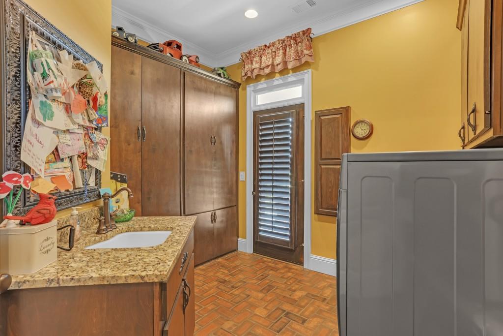 3386 Chandler Road Good Hope, GA 30641 - Photo 29 of 96 a bathroom with a granite countertop sink and a mirror