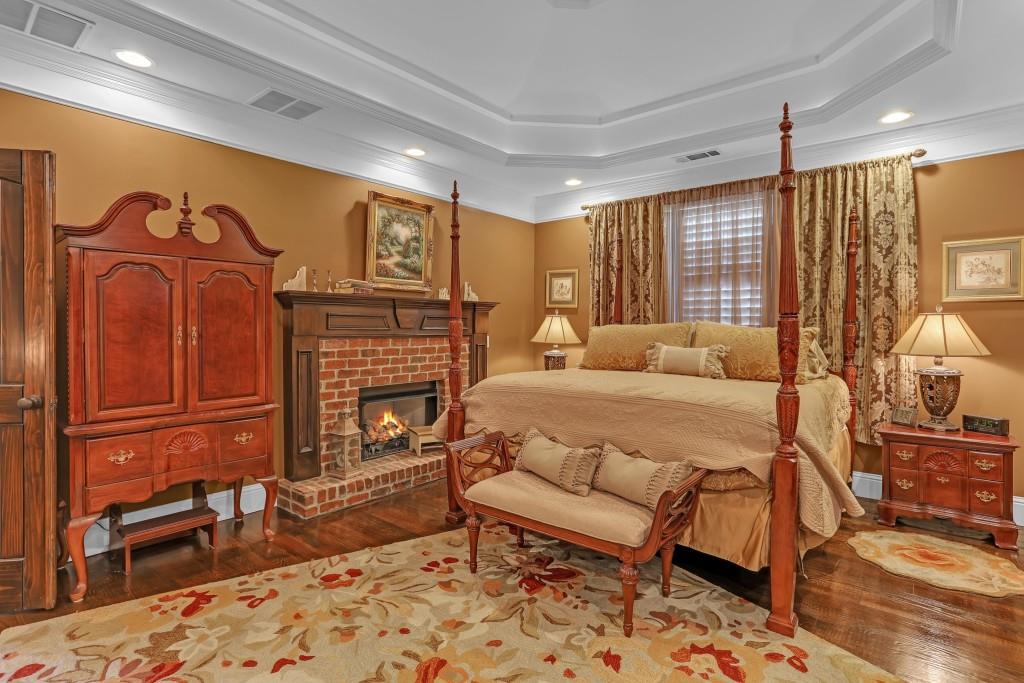 3386 Chandler Road Good Hope, GA 30641 - Photo 47 of 96 a bedroom with a bed a dresser with the outer view