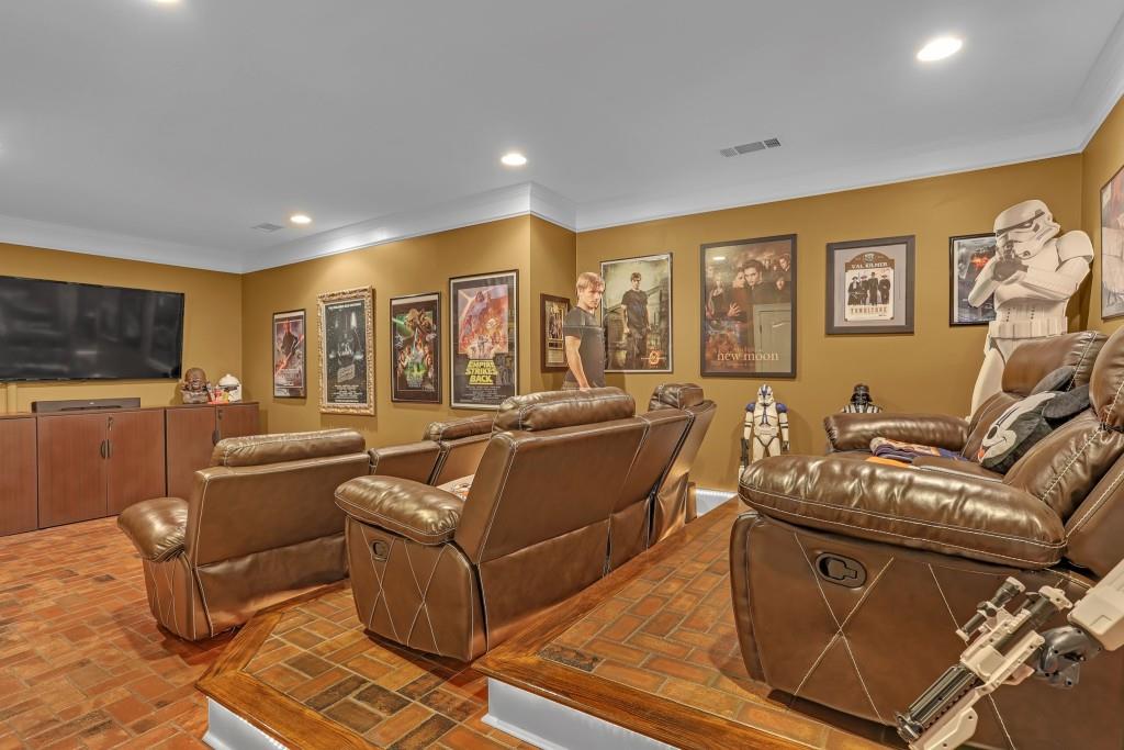 3386 Chandler Road Good Hope, GA 30641 - Photo 53 of 96 a living room with furniture and a flat screen tv