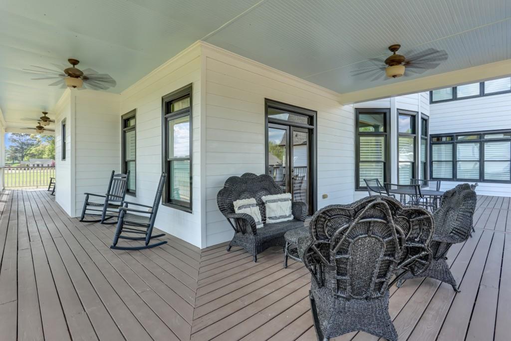 3386 Chandler Road Good Hope, GA 30641 - Photo 66 of 96 a view of a dining room with furniture and wooden floor