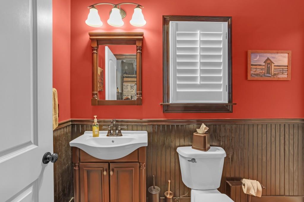 3386 Chandler Road Good Hope, GA 30641 - Photo 70 of 96 a bathroom with a toilet sink and mirror