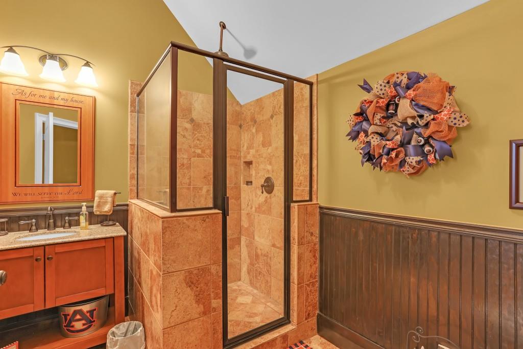 3386 Chandler Road Good Hope, GA 30641 - Photo 72 of 96 a bathroom with a double vanity sink and a mirror