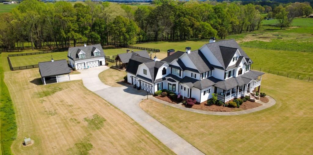 3386 Chandler Road Good Hope, GA 30641 - Photo 82 of 96 a view of a swimming pool with lawn chairs and a yard