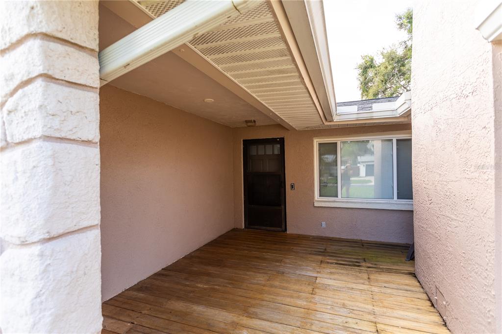 2021 Valley Drive Dunedin, FL 34698 - Photo 46 of 79 a view of an empty room with a window
