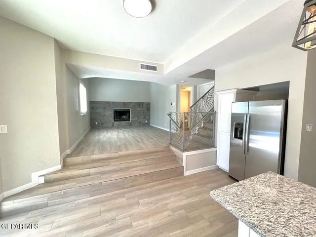 a view of a hallway view with staircase