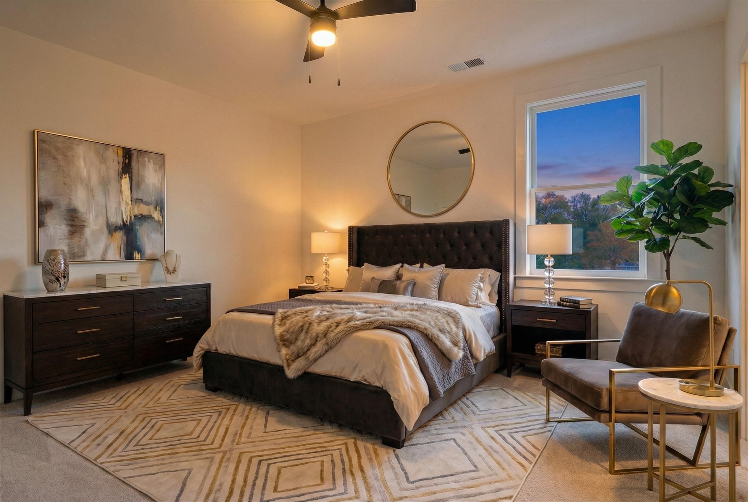 760 Meda Street Memphis, TN 38104 - Photo 13 of 16 a bedroom with a bed window and potted plant