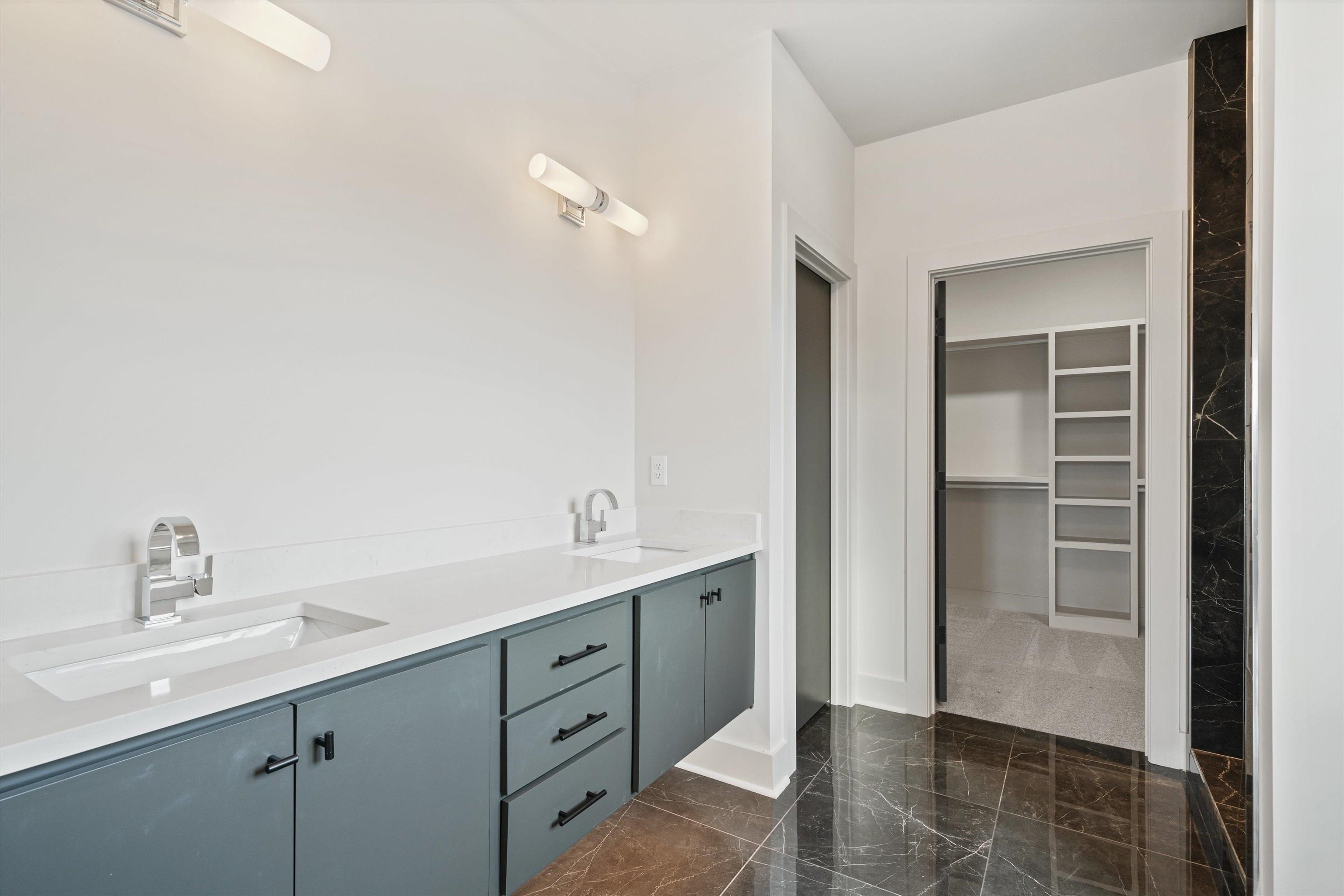 760 Meda Street Memphis, TN 38104 - Photo 8 of 16 a bathroom with a sink and a mirror