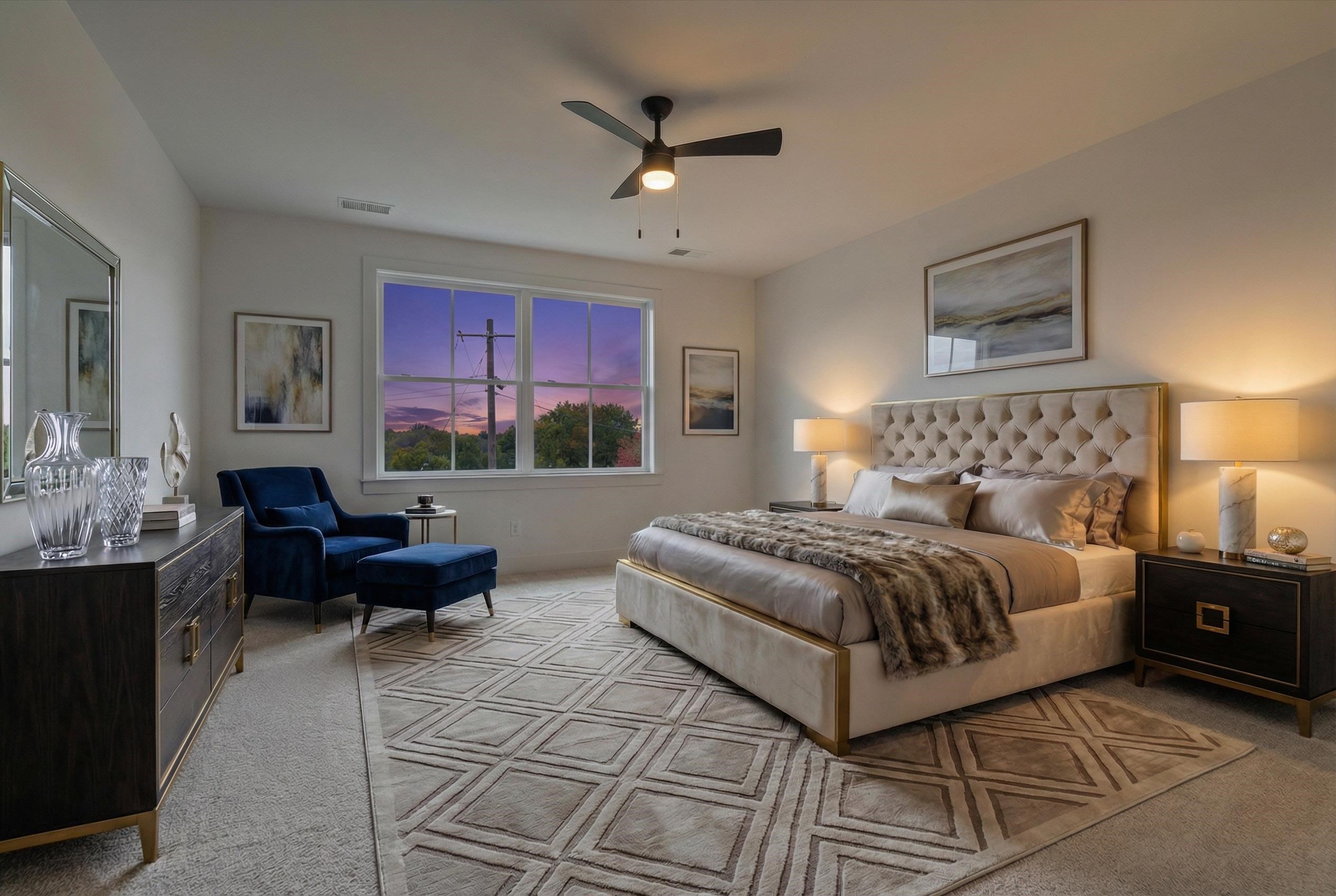 760 Meda Street Memphis, TN 38104 - Photo 10 of 16 a spacious bedroom with a bed and a couch