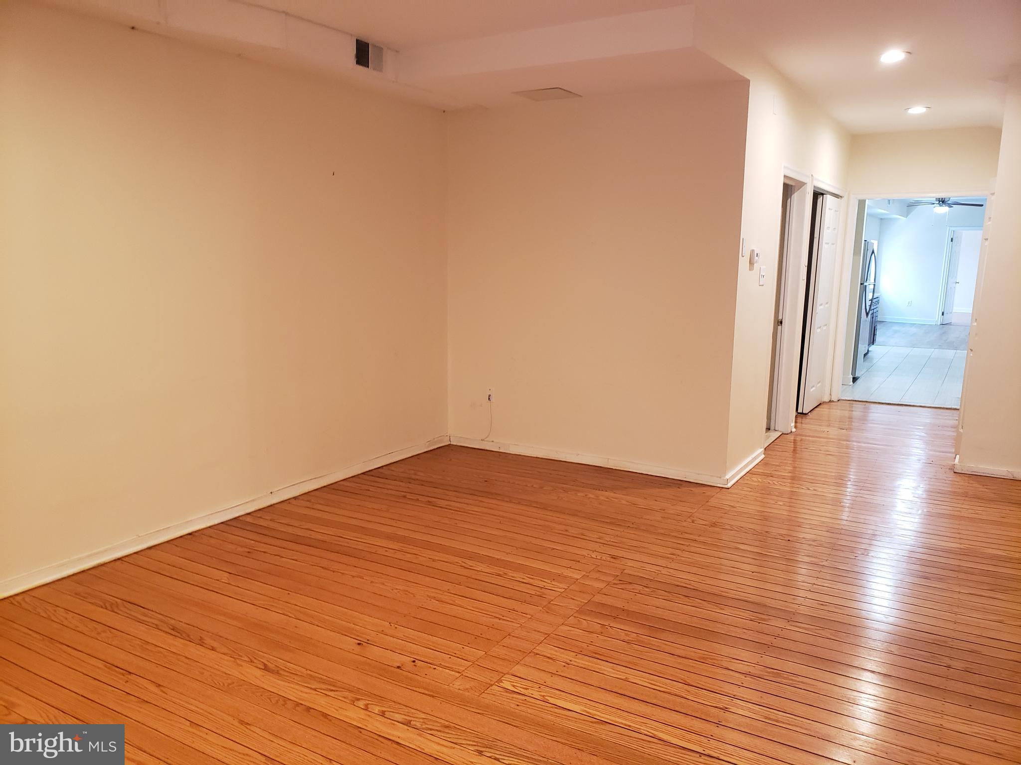 319 Market Street, Unit 3 Philadelphia, PA 19106 - Photo 6 of 14 a view of empty room with wooden floor