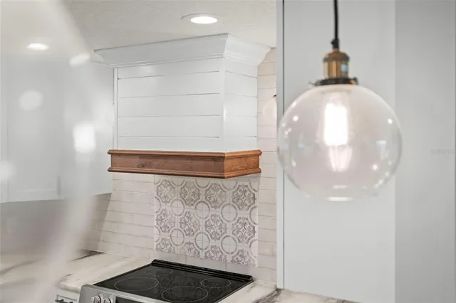 a bathroom with a shower and a sink