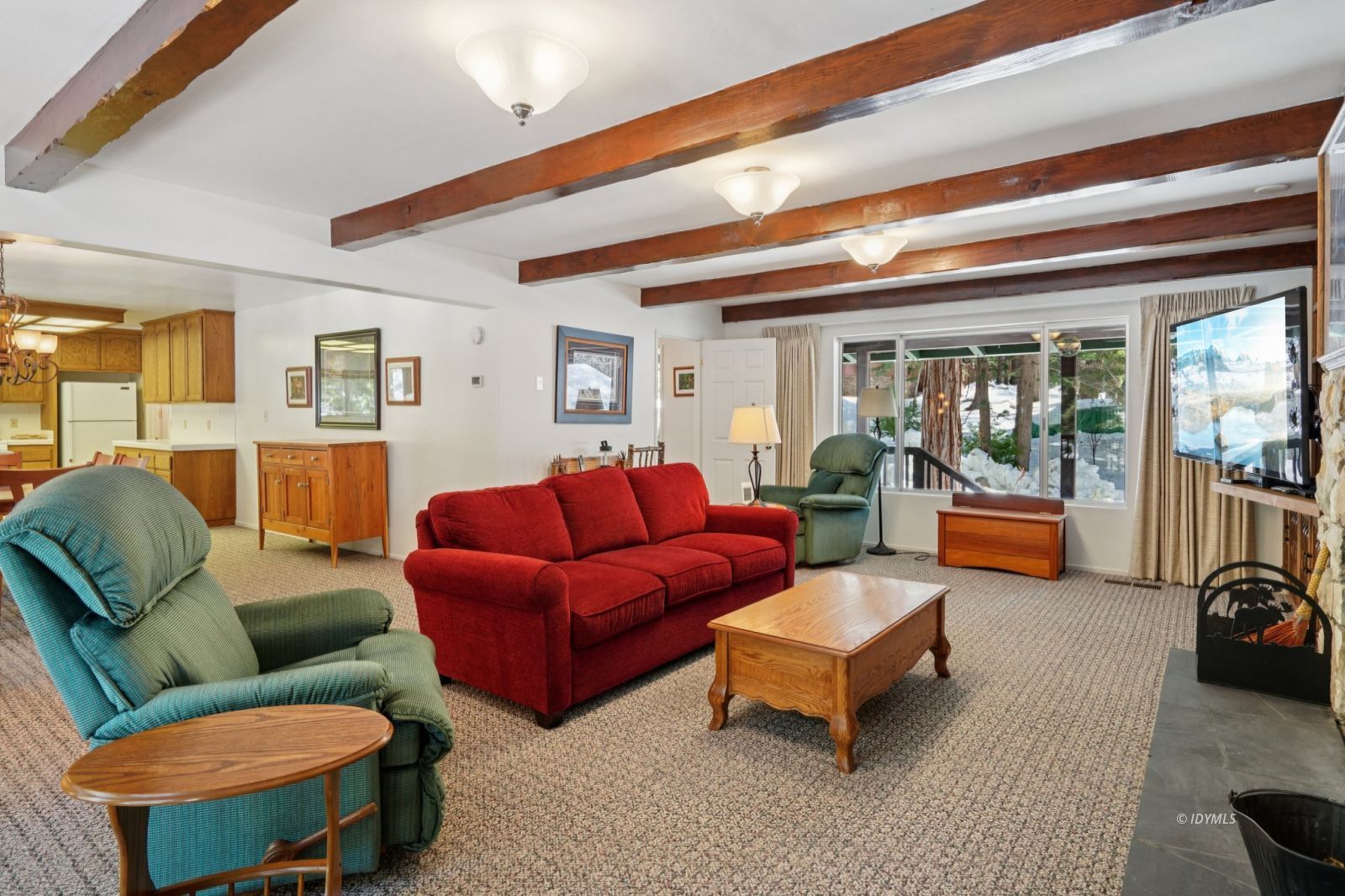 24490 Upper Rim Rock Road Idyllwild, CA 92549 - Photo 14 of 41 a living room with furniture and a large window