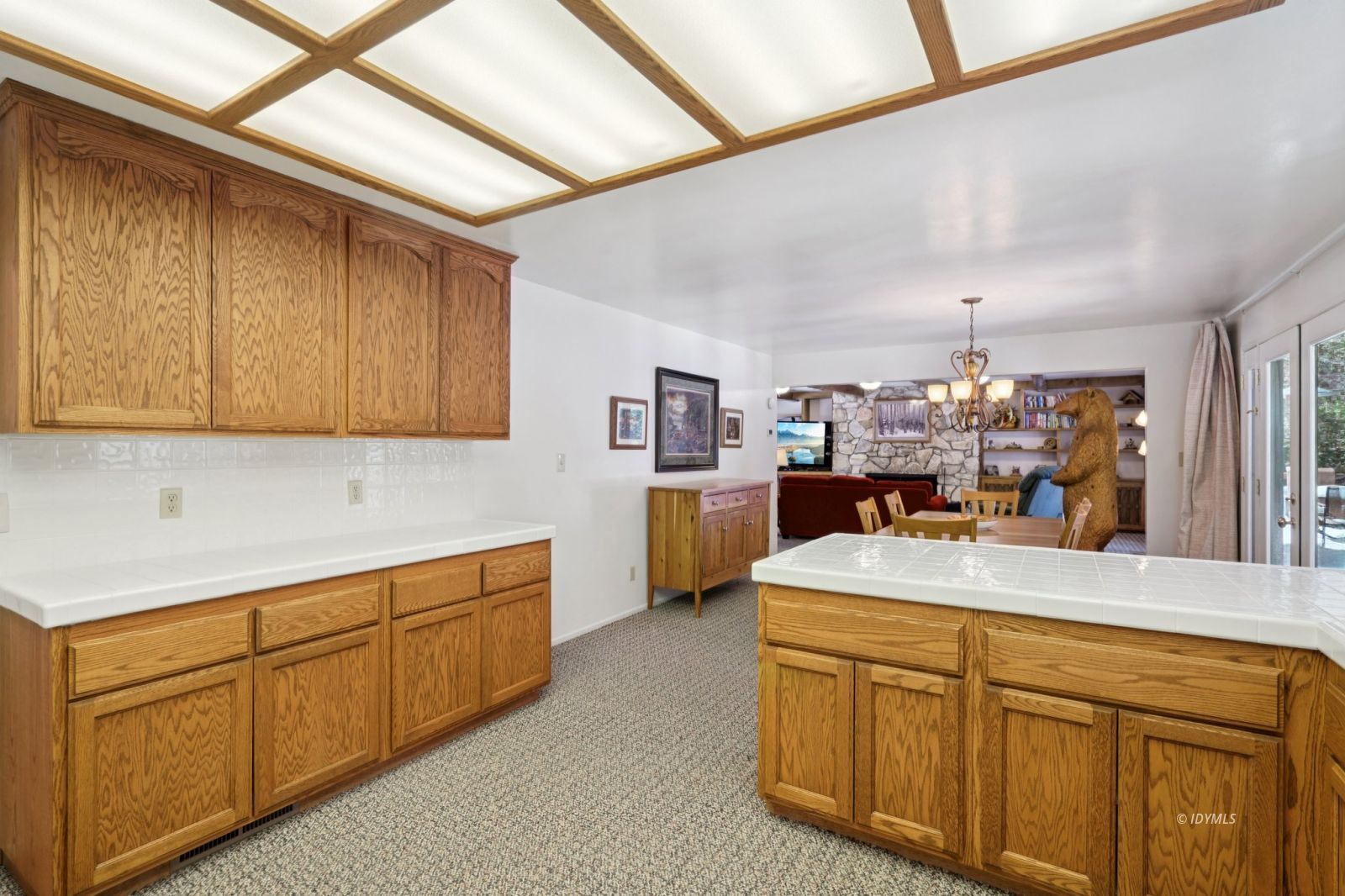 24490 Upper Rim Rock Road Idyllwild, CA 92549 - Photo 19 of 41 a kitchen with cabinets a sink and appliances