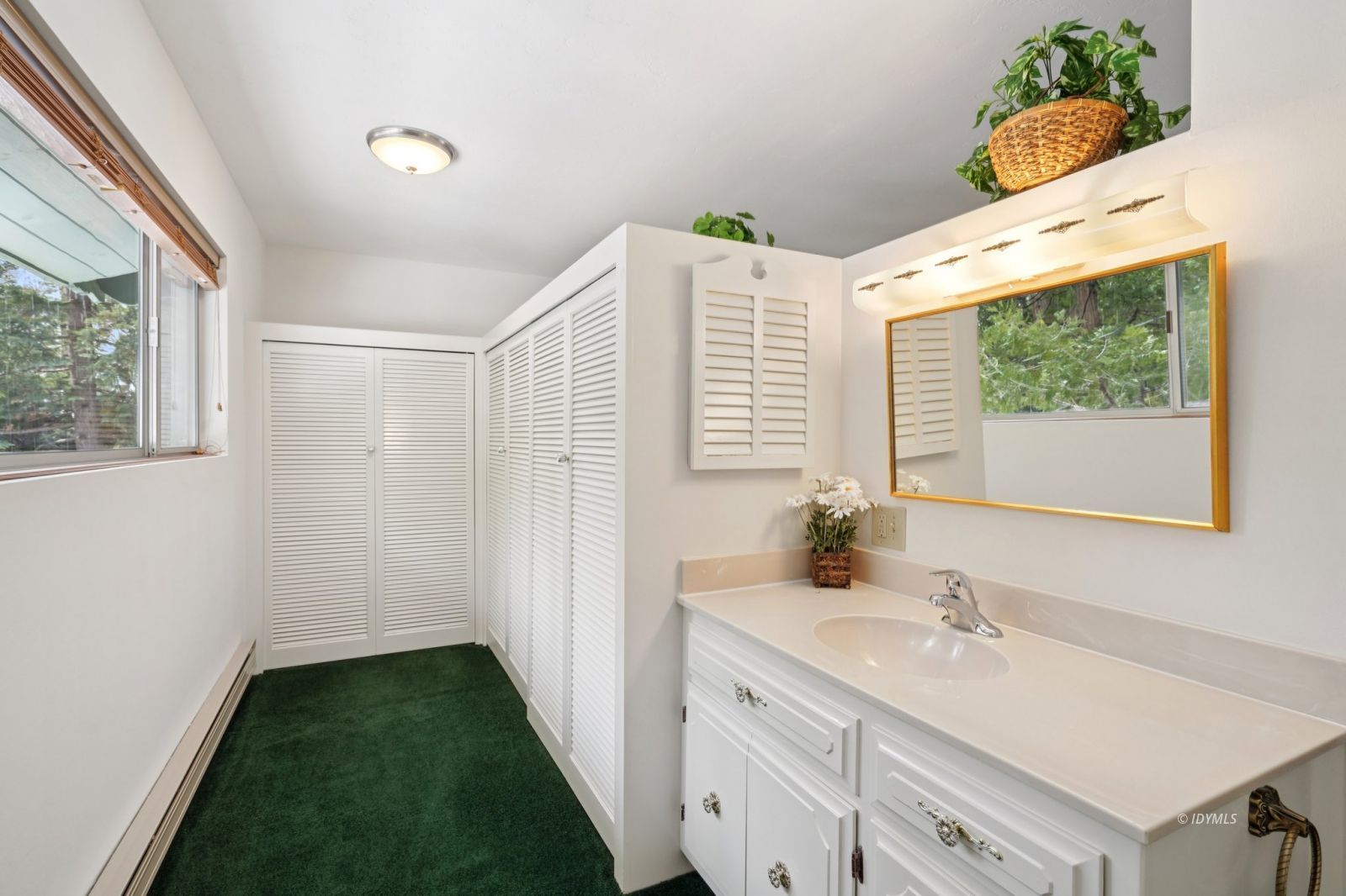 24490 Upper Rim Rock Road Idyllwild, CA 92549 - Photo 26 of 41 a bathroom with a sink and a mirror