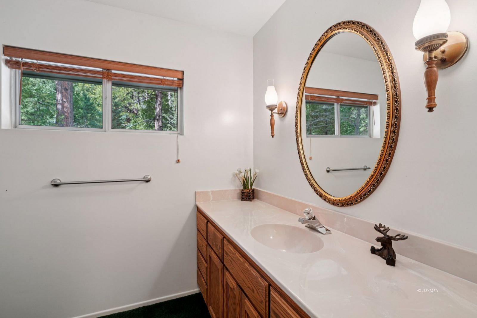 24490 Upper Rim Rock Road Idyllwild, CA 92549 - Photo 29 of 41 a bathroom with a sink and a mirror