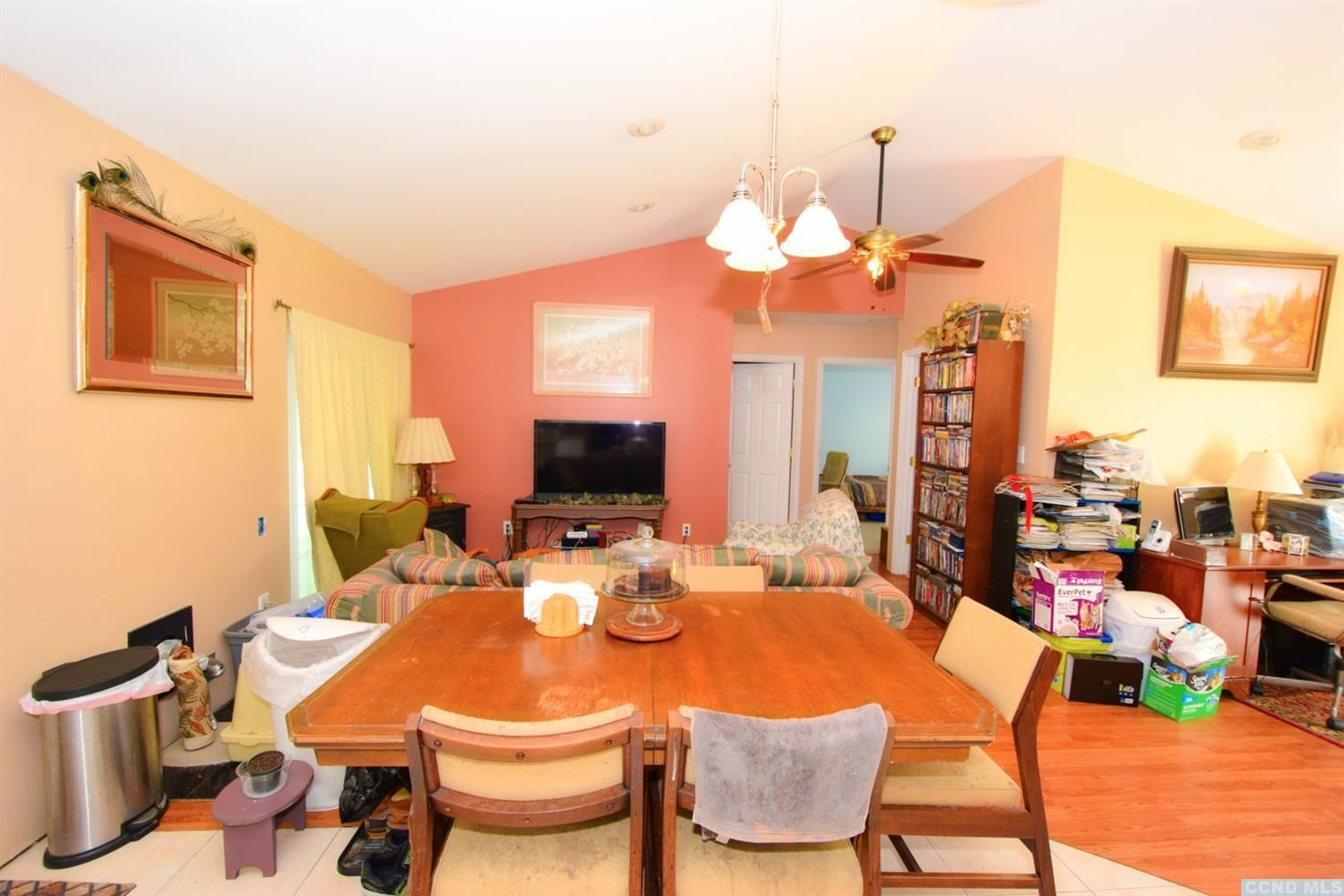 17 Ross Road Cairo, NY 12413 - Photo 6 of 10 a view of a dining room with furniture a chandelier and wooden floor