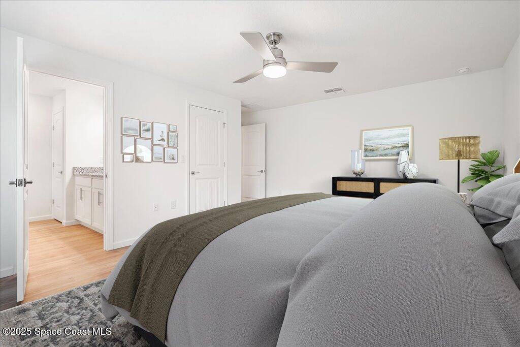 578 Avocado Road Northwest Palm Bay, FL 32907 - Photo 8 of 14 Ruby primary bedroom 2