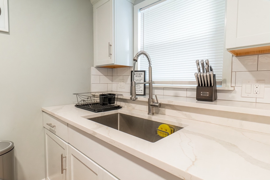 33 Bristow Street, Unit 2 Saugus, MA 01906 - Photo 4 of 21 a kitchen with a sink and a window
