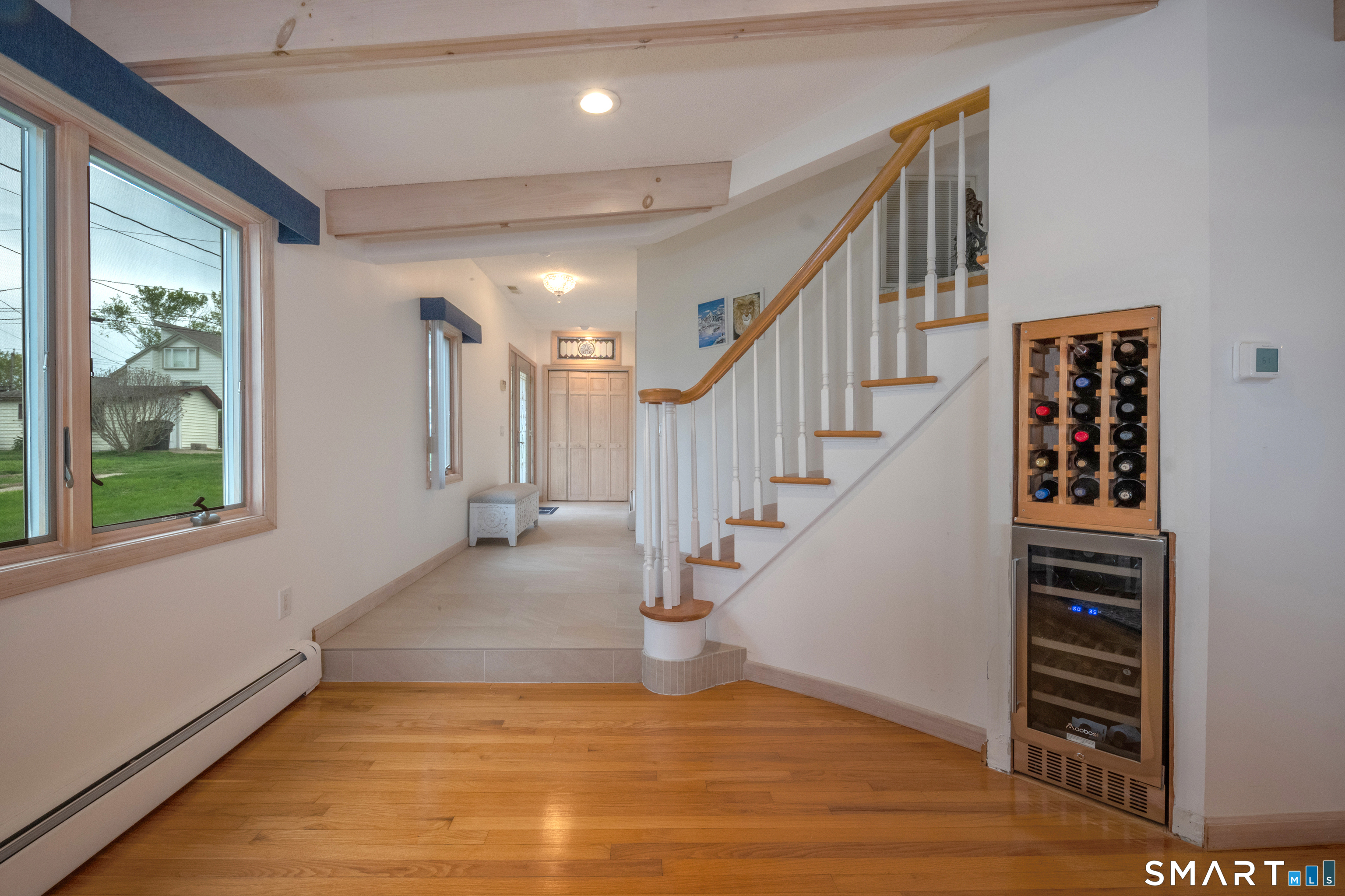 5 A Loop Road, Unit 5A Clinton, CT 06413 - Photo 28 of 37 a view of entryway and hall with wooden floor