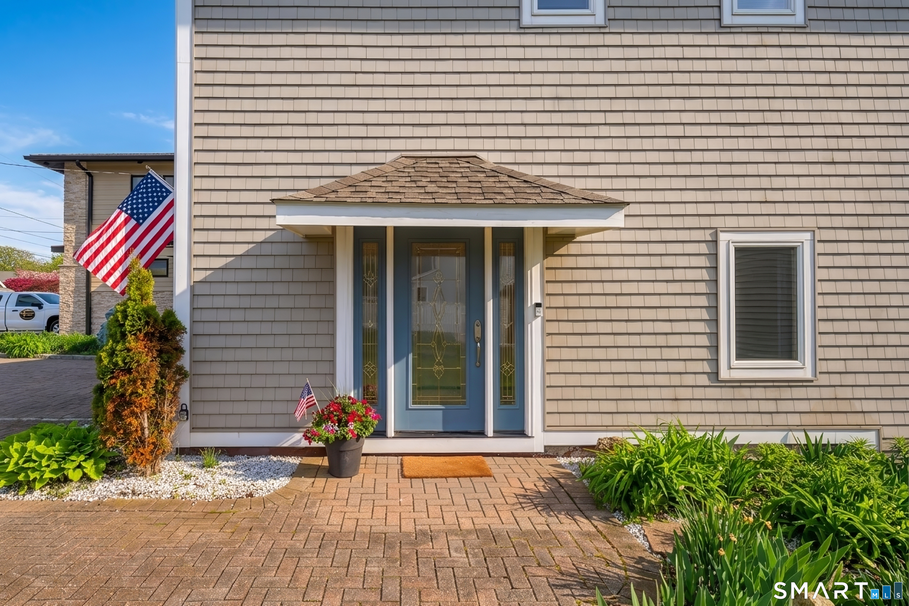 5 A Loop Road, Unit 5A Clinton, CT 06413 - Photo 33 of 37 a view of a house with patio