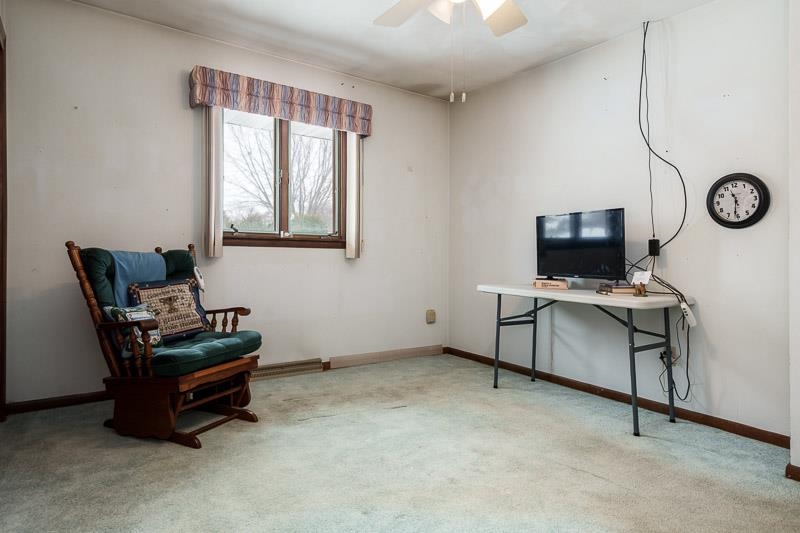 1126 Main Street Pecatonica, IL 61063 - Photo 19 of 40 a living room with furniture and a flat screen tv
