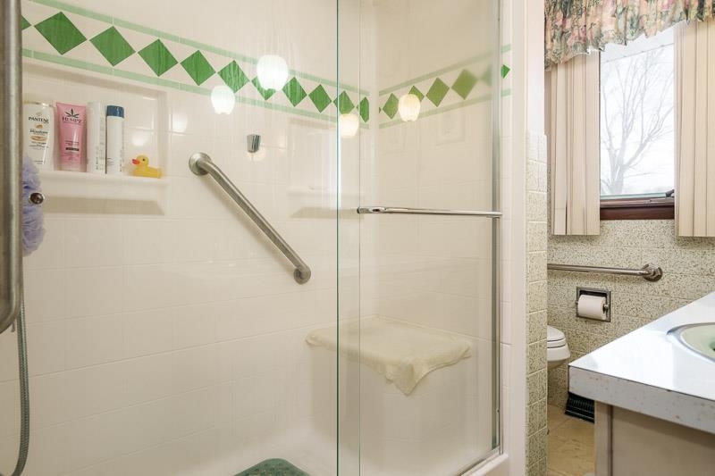 1126 Main Street Pecatonica, IL 61063 - Photo 22 of 40 a bathroom with a shower and a sink