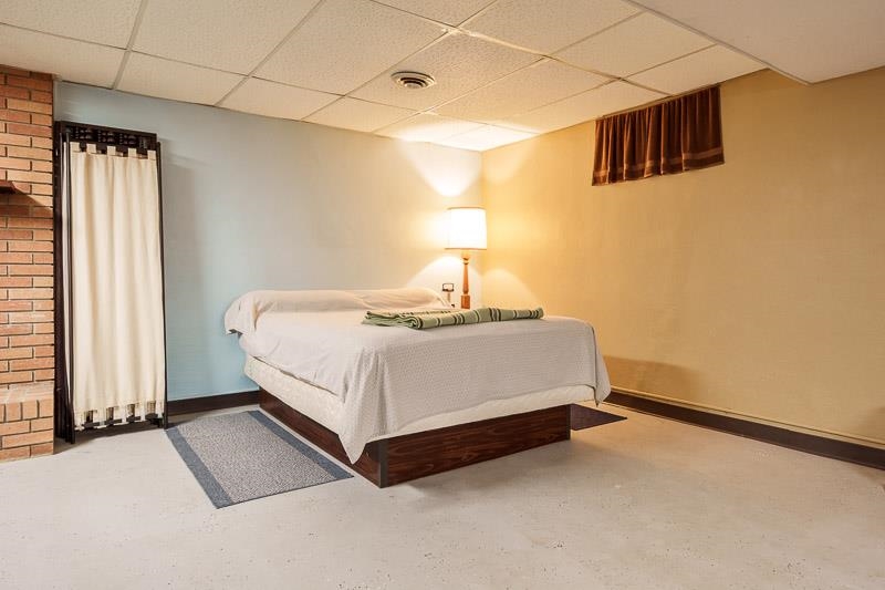 1126 Main Street Pecatonica, IL 61063 - Photo 25 of 40 a bedroom with a bed and a window