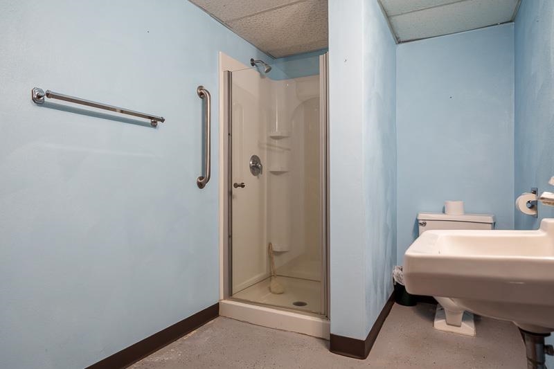 1126 Main Street Pecatonica, IL 61063 - Photo 30 of 40 a bathroom with a sink and mirror