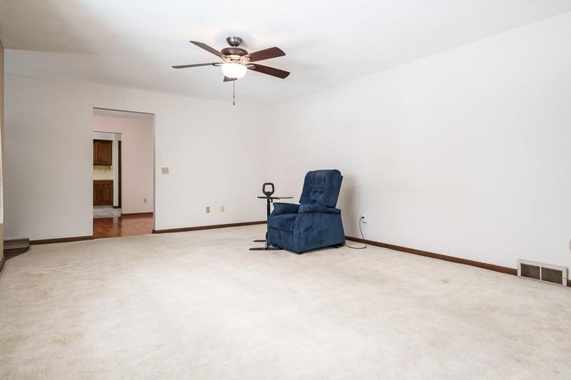 1126 Main Street Pecatonica, IL 61063 - Photo 4 of 40 an empty room with closet and ceiling fan