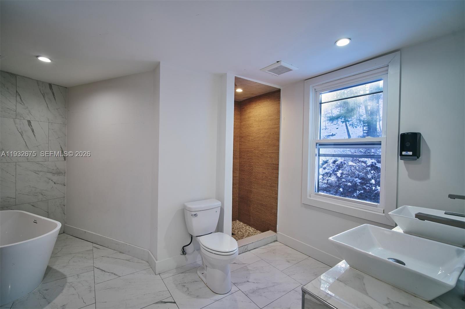 189 McNamara Road Spring Valley, NY 10977 - Photo 21 of 47 a bathroom with a toilet and shower