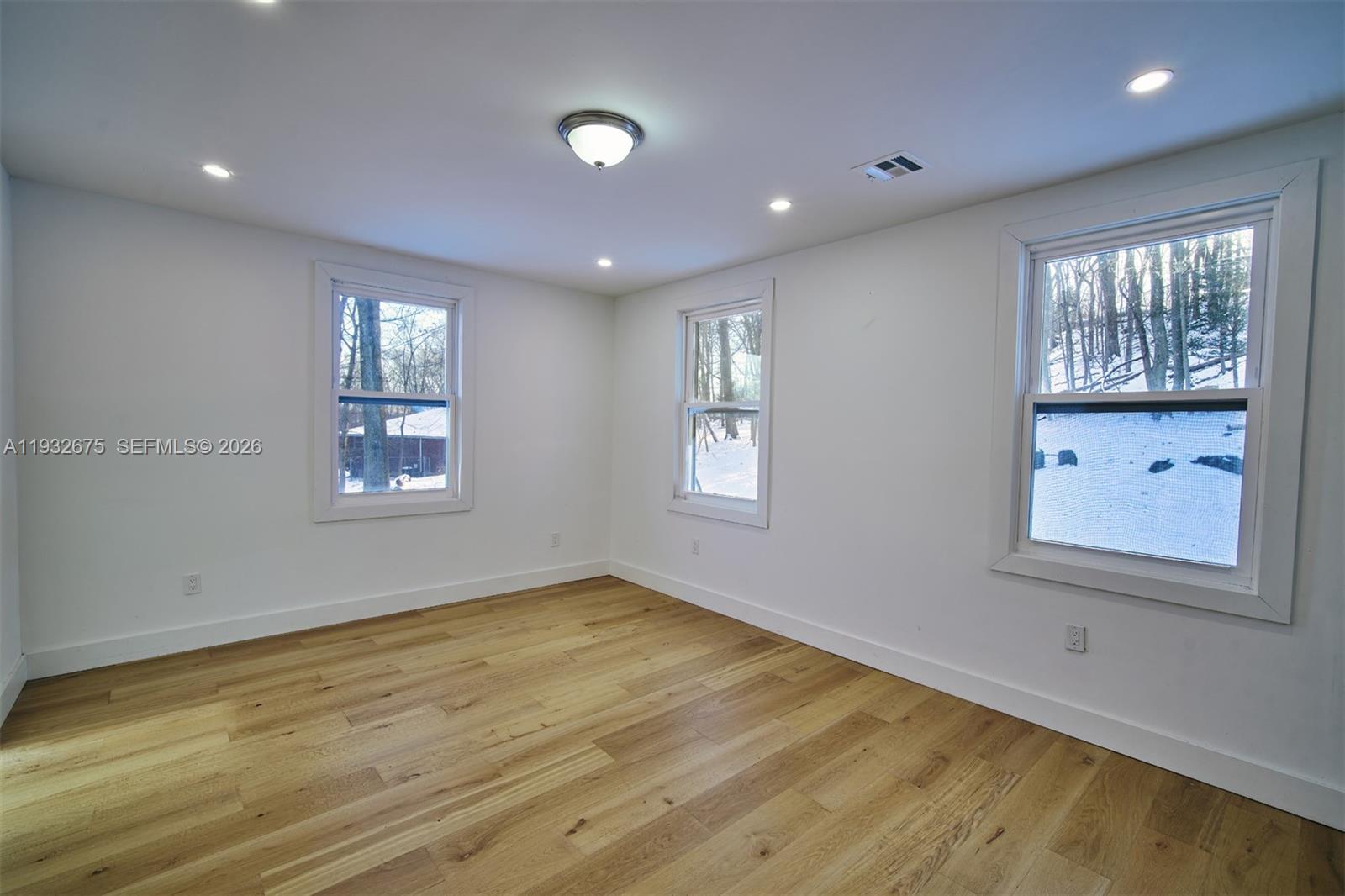 189 McNamara Road Spring Valley, NY 10977 - Photo 24 of 47 an empty room with windows