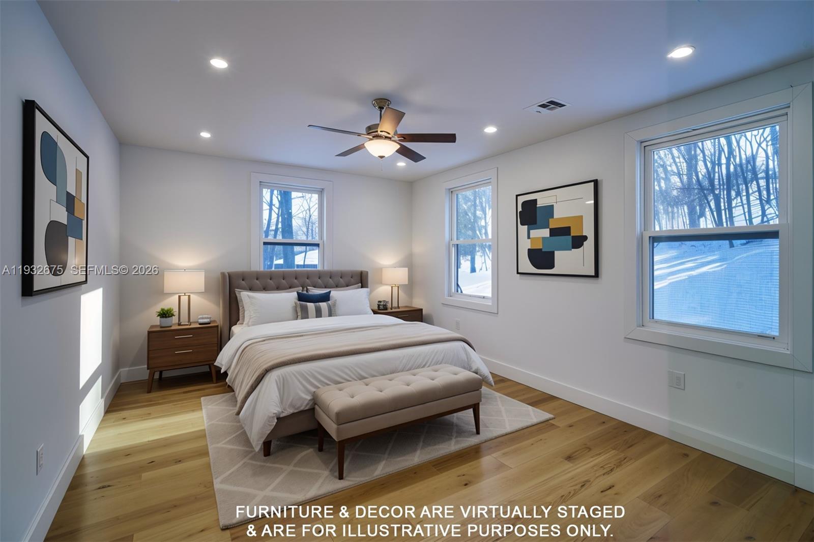 189 McNamara Road Spring Valley, NY 10977 - Photo 25 of 47 a bedroom with a large bed and a chandelier