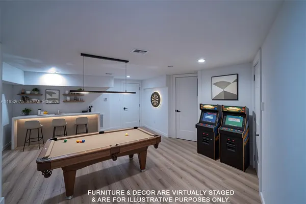 a view of a livingroom with wooden floor