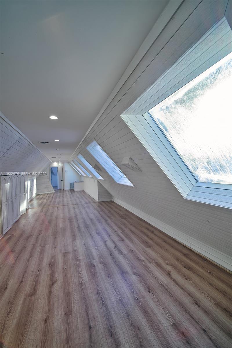 189 McNamara Road Spring Valley, NY 10977 - Photo 39 of 47 a view of empty room with wooden floor and fan