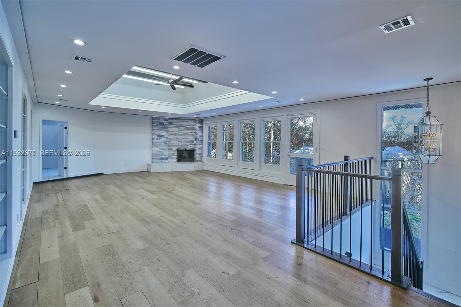 189 McNamara Road Spring Valley, NY 10977 - Photo 4 of 47 a view of an empty room with wooden floor