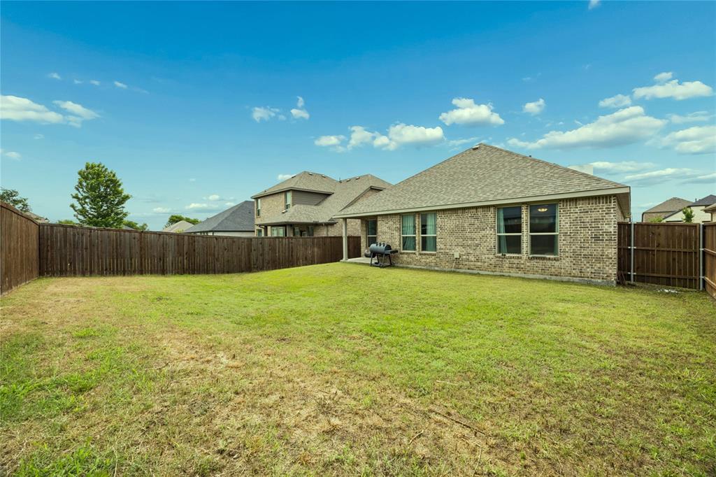 638 Hazeltine Road Red Oak, TX 75154 - Photo 24 of 29 a house view with a garden space