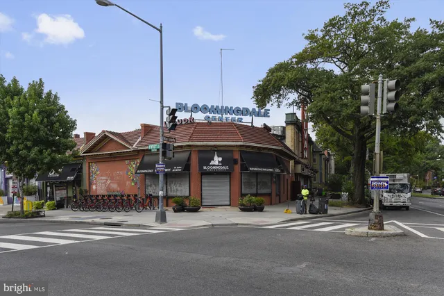 a view of a building with a street