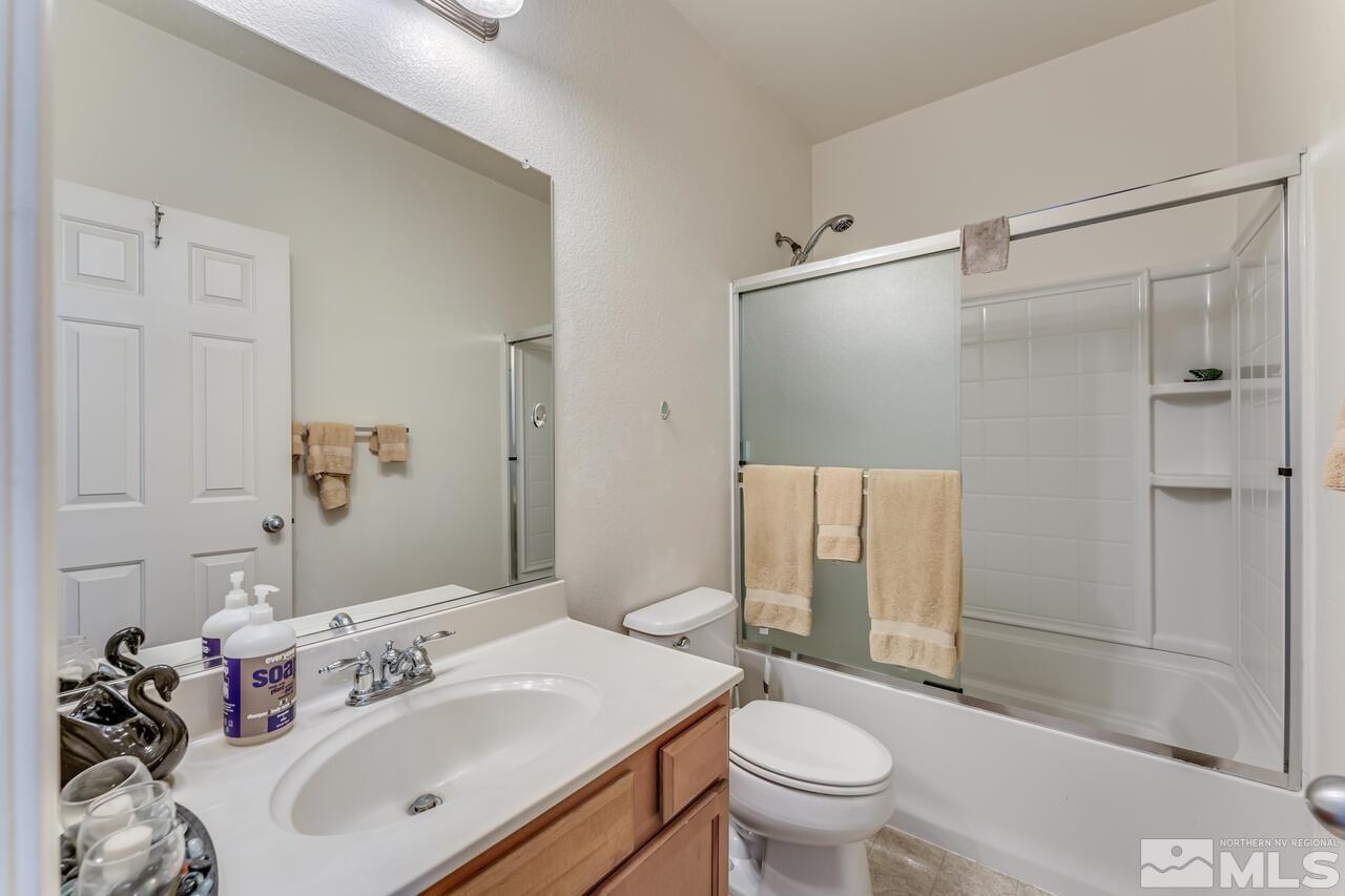 2110 Stanton Lane Reno, NV 89502 - Photo 27 of 32 a bathroom with a sink toilet and shower