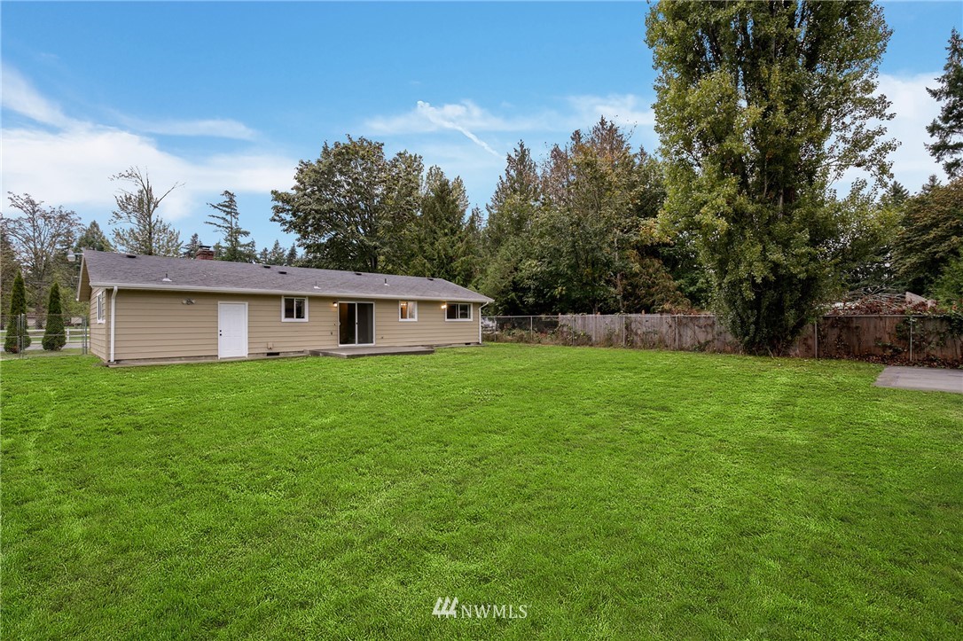 34660 Military Road South Federal Way, WA 98001 - Photo 21 of 24 a front view of house with a garden