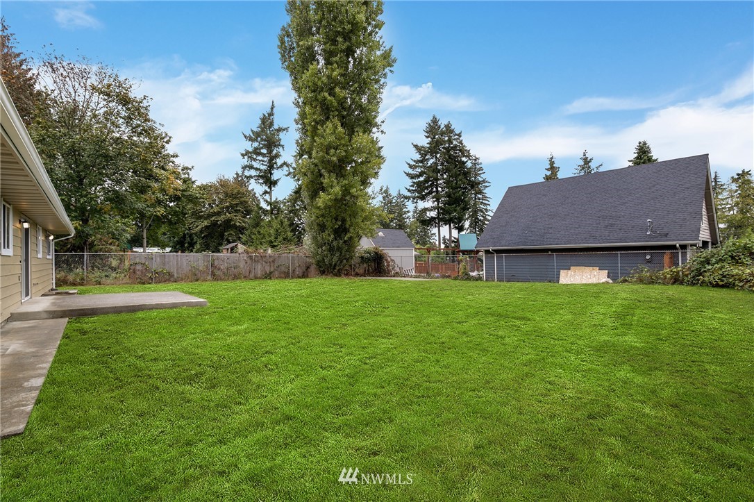 34660 Military Road South Federal Way, WA 98001 - Photo 23 of 24 a view of a house with backyard and garden