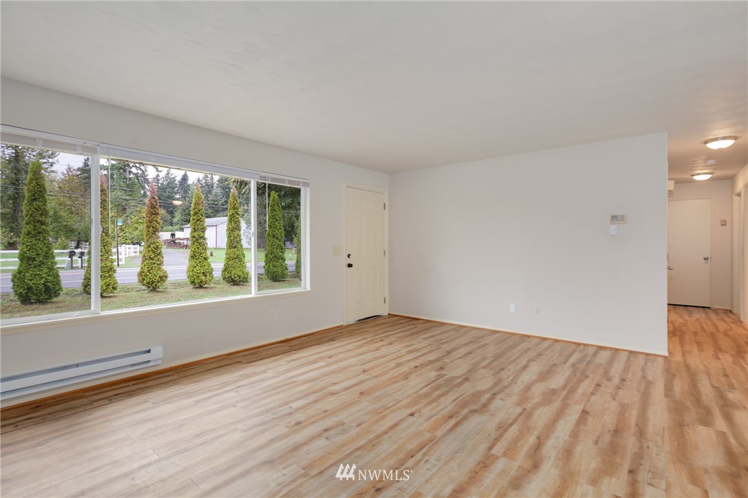 34660 Military Road South Federal Way, WA 98001 - Photo 5 of 24 wooden floor in an empty room with a window