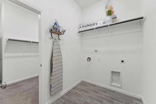 a view of a hallway with closet