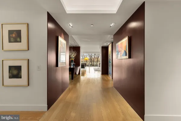 a kitchen with counter top space sink stove and refrigerator
