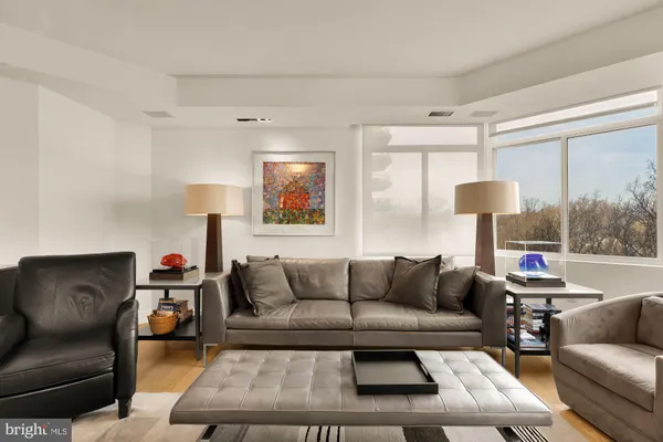 a living room with furniture and a window