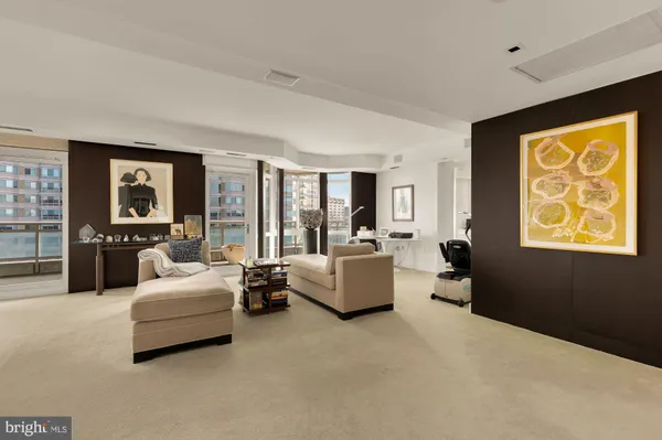 a bedroom with furniture and a couch